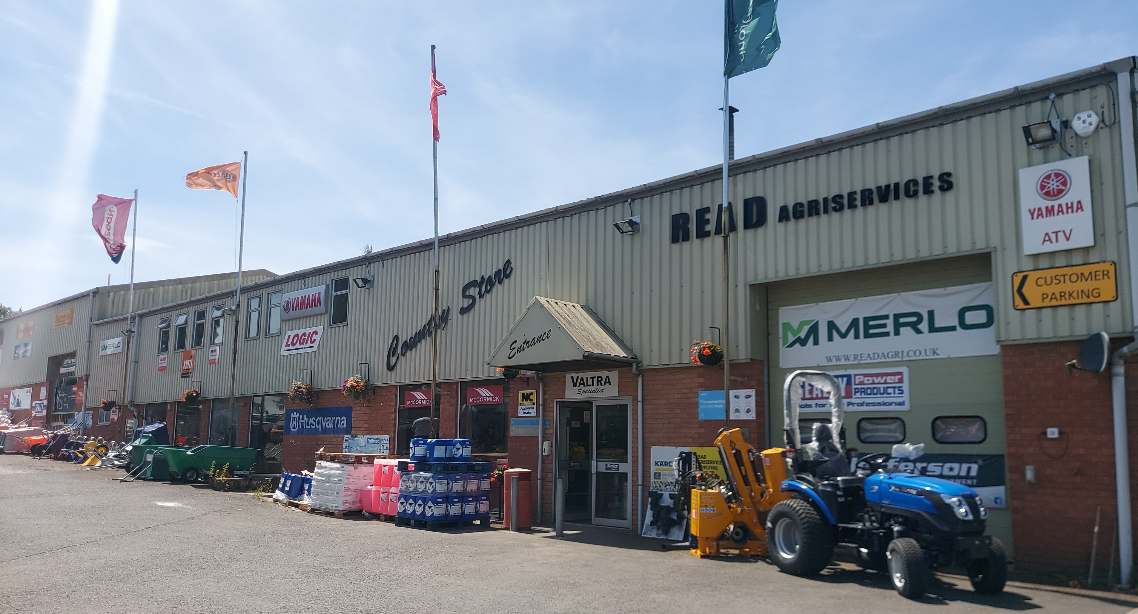 Front of Read Agriservices premises displaying a range of agricultural machinery in Somerset