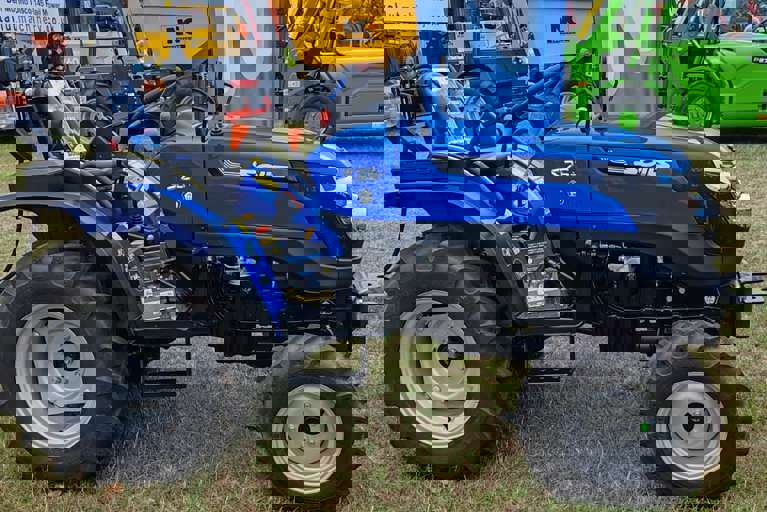 Blue Solis tractor on a showground demonstrating the benefits of VIN Chip security marking.
