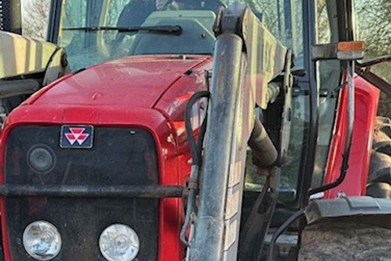 VIN CHIP fitting identification system to a Massey Ferguson tractor, enhancing security and theft prevention.