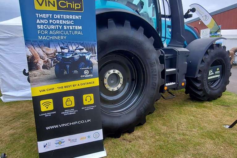 Agricultural tractor displayed alongside the VIN Chip banner at the Royal Highland Show 2026.