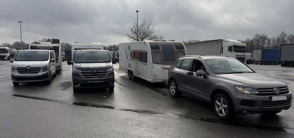 Three caravans being towed after being recovered from theft.